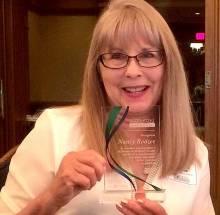 Nancy with Woman of Distincton Award